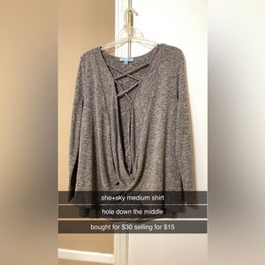 sweater with hood going down middle